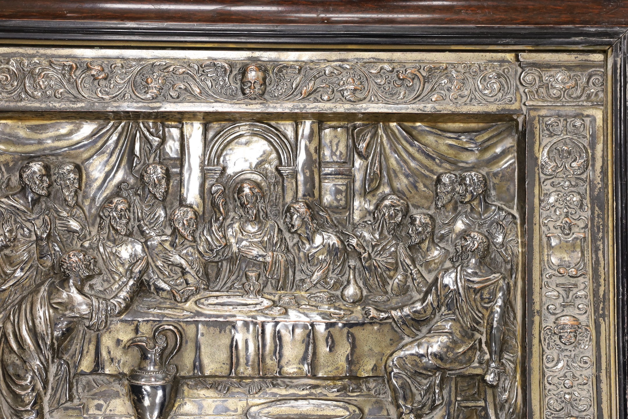 A framed embossed plaque, The Last Supper, silver plate on copper, 34.5 x 50cm excl frame